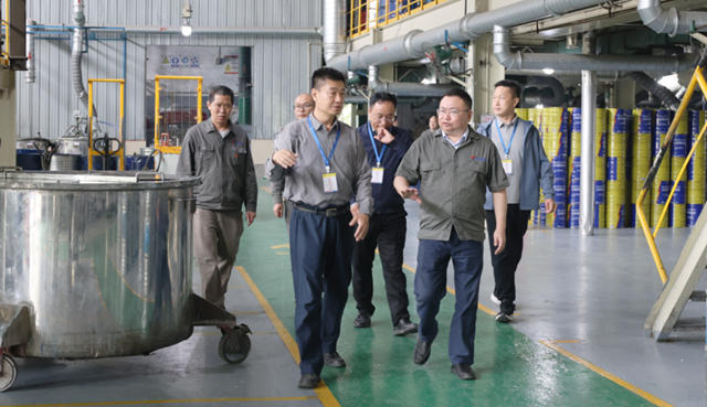 重慶三峽油漆與神龍騰達共商合作新篇章